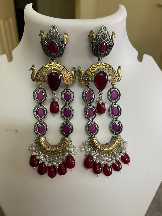 Beautiful long dual tone earrings with stone